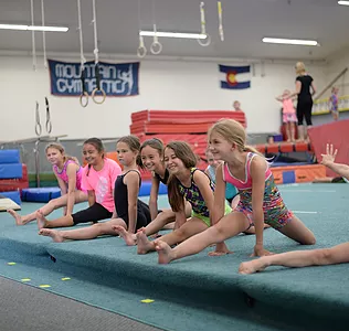girls practicing splits