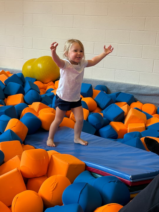 girl in foam pit