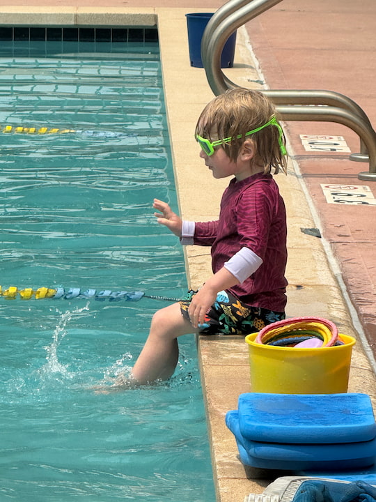 Boy in swim class